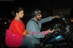 Arshad Warsi on his Harley bike with wife Maria as they went to watch The King_s Speech on 8th March 2011 (16).JPG